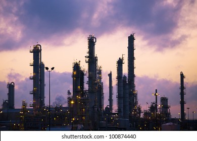 Exhaust Pipes From The Imperial Oil Refinery In Sarnia. Shot In The Morning Just Before Sunrise.