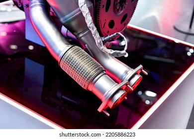 The Exhaust System Of An Internal Combustion Engine Assembly On A Store Display Case.