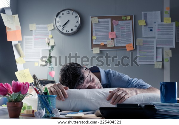 Exhausted Businessman Sleeping Workplace Pillow On Stock Photo