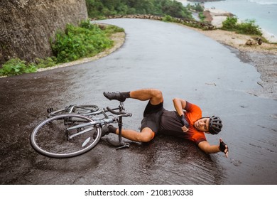 Exhausted Cyclist Fell Down On The Road