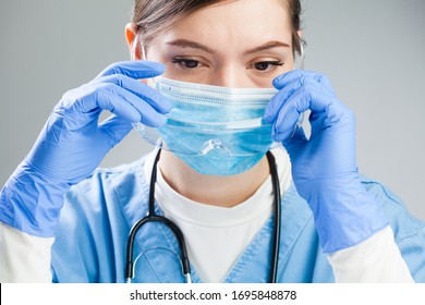 Exhausted Doctor Taking Protective Glasses Off,devastated After Loss Of Patient,unsuccessful Treatment Or Wrong Diagnosis,Coronavirus COVID-19 Corona Virus Disease Global Pandemic Crisis, Death Toll 