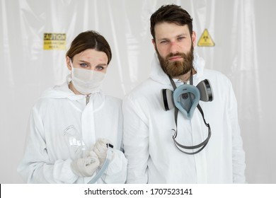 Exhausted Doctors Or Nurses Taking Of Protective Mask Uniform. Coronavirus Covid-19 Outbrek. Mental State Of Medical Professional. Overworked Health Workers With Tears In His Eyes