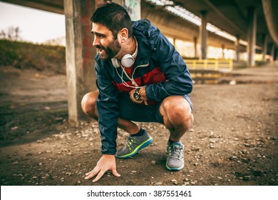 Exhausted man resting after jogging - Powered by Shutterstock