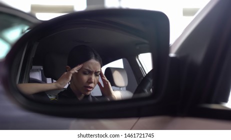 Exhausted Policewoman Feeling Headache Massaging Temples, Stressed Work, Busy