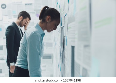 Exhausted Stressed Business Team Overloaded With Financial Reports And Problems