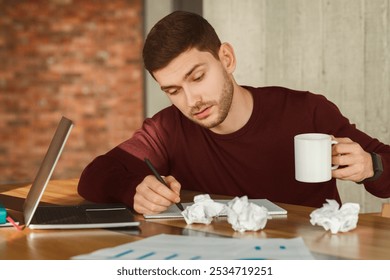 Exhausting Job. Overworked Employee Holding Coffee Cup Almost Sleeping At Workplace Indoor. Selective Focus - Powered by Shutterstock