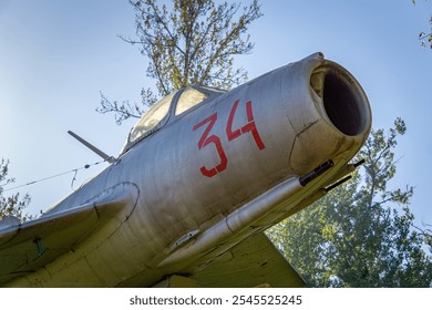 exhibit of old soviet MiG 15Lim1 planes with Polish military markings, checkerboard of Polish airman. - Powered by Shutterstock