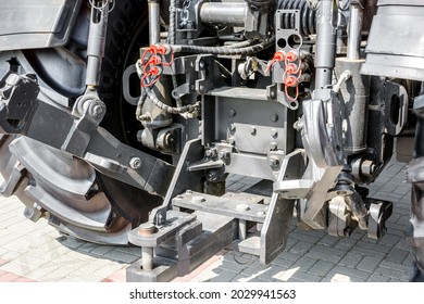 Exhibition Of Agricultural Machinery. Trailer Device Of A Wheeled Tractor In Close-up.