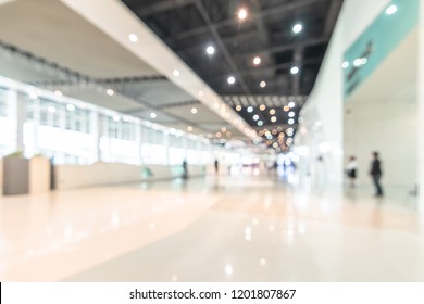 Exhibition Event Convention Hall Business Blur Background Of Tech Expo, Trade Fair, Passenger Terminal Or Museum Gallery Lobby With Blurry Interior Large Corridor Hallway White Room Empty Space