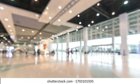Exhibition event convention hall business blur background of tech expo, trade fair, passenger terminal or museum gallery lobby with blurry interior large corridor hallway white room empty space