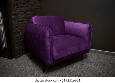 An Exhibition Of A Stylish Comfortable Purple Velour Armchair Dispalyed For Sale In A Furniture Design Showroom. Upholstered Furniture Store, Home Design Concept
