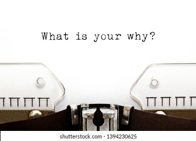 Existential question What Is Your Why typed on vintage typewriter with copy space.