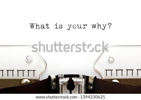 Existential question What Is Your Why typed on vintage typewriter with copy space.