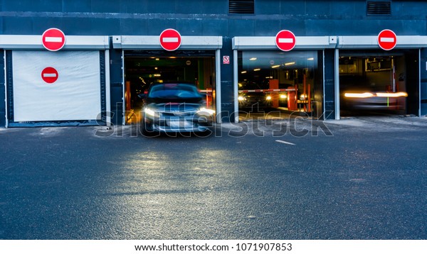 exit\
of cars from  underground Parking of shopping\
mall