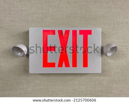 Exit emergency sign. Fire exit. Rescue red led light. Modern fire security diversity. Red fire escape sign hang.