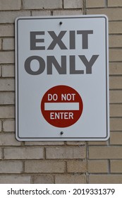 Exit Only Sign On A Wall
