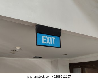 Exit Sign On Office Building Ceiling