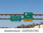 Exit signs in Berwyn, Pennsylvania on US202 South for Chesterbrook Boulevard and PA 252 Swedesford Road South toward Paoli