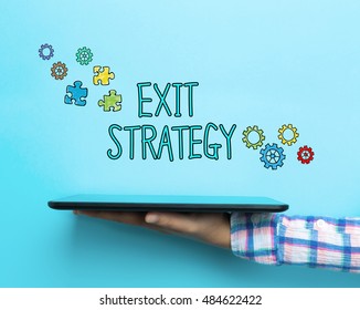 Exit Strategy concept with a tablet on blue background