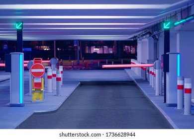 Exit From Underground Parking. Underground Parking Garage. Barrier At Entrance And Exit Of A Car Parking Garage. Barrier In A Car Park. Interior Of Parking.