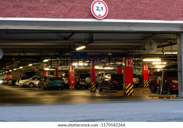 Exit of\
Underground Parking or Garage with\
Cars.