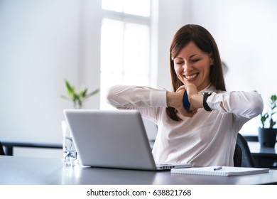 Exited Successful Business Woman In Office