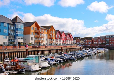 Exmouth, Devon, England, U.K. 09/15/2017.  Originally an old harbour on the River Exe estuary it has been turned into a marina surrounded by colourful apartments.
