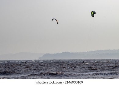 Exmouth, Devon, UK - March 22 2022: Kite Surfers On The Beach At Exmouth