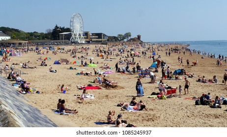 Exmouth. A seaside town in Devon South West England . Crowds flock to the beach on May Bank Holiday Sunday 2018