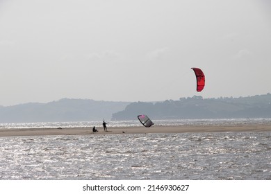 Exmouth, UK - March 22 2022: Kite Surfers On The Beach At Exmouth