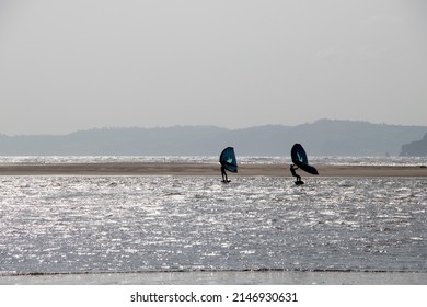 Exmouth, UK - March 22 2022: Kite Surfers On The Beach At Exmouth