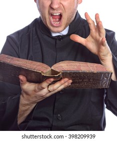 Exorcism - the priest with bible - Shutterstock ID 398209939