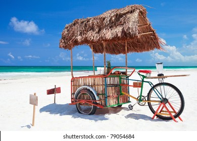 Exotic beach bar transformed from bike at Caribbean beach in Mexico