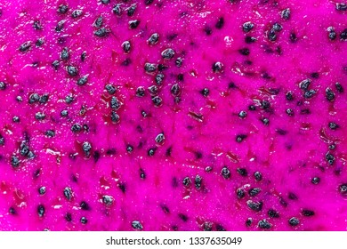 Exotic Pink Dragonfruit Cut Macro Photo On Background. Dragon Fruit Close Up. Pitahaya Texture Photo. Sweet Tropical Fruit, Juicy Pitaya Cut