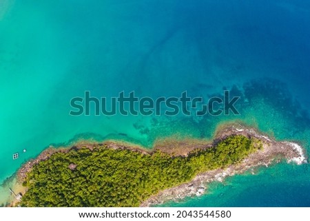 Exotic sea beach island turquoise water with tropical green tree forest aerial view