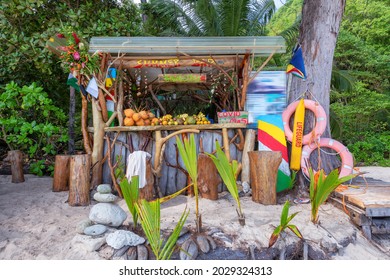 Exotic summer beach bar with mixed fruits on Seychelles tropical island.