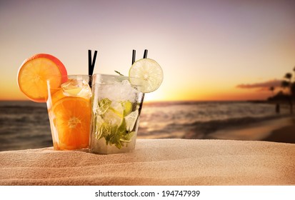 Exotic summer drinks , blur sandy beach on background - Powered by Shutterstock