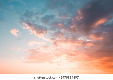 Exotic sunset and soft pink clouds of pastel tones. Scenic image of textured sky. Perfect summertime wallpaper. Bright epic sky. Dramatic evening light and fiery orange sunset. Beauty of earth. - Powered by Shutterstock