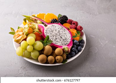 Exotic Tropical Fruits With Dragon Fruit, Longan, Maracuya On A Plate