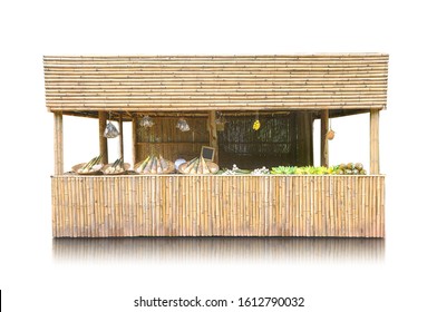 Exotic tropical retail kiosk with fruits and vegetables isolated on white background, clipping path included.