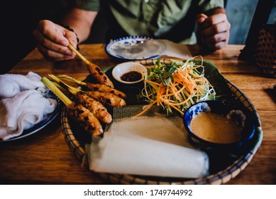 Exotic Vietnamese Food With Men's Hands