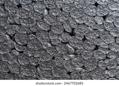 expanded polystyrene board eps with graphite macro shot, background.