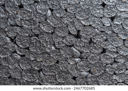 expanded polystyrene board eps with graphite macro shot, background.
