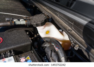 Expansion Tank For Brake Fluid Inside The Engine Compartment.