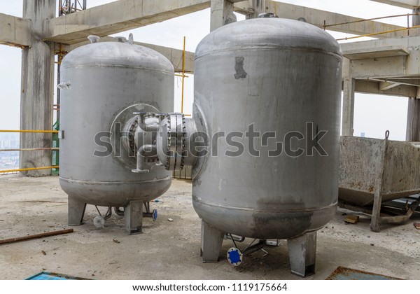 expansion tank\
for water pressure with a water pump\
