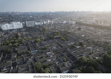 Expansive Aerial View of a Vibrant Urban Neighborhood at Dusk   - Powered by Shutterstock