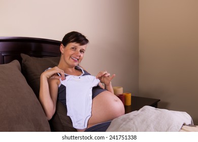 Expecting Mom With A Baby Onesie