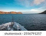Expedition ship near Big Diomede Island witch other name is Ratmanov Island , Russian Chukotka district on the left and Little  Diomede Island  on the right,Alaska region USA, Bering strait