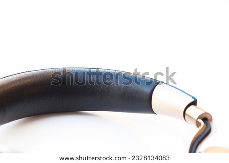 Expensive full-size wireless headphones isolated on a white background.
