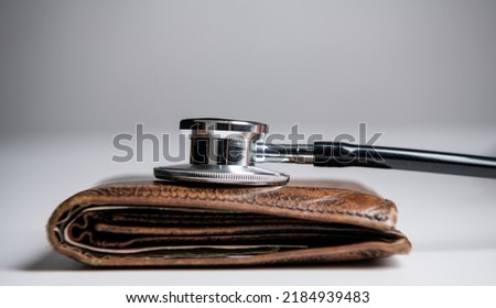 expensive medicine concept. stethoscope and wallet as symbol of expensive medicine.